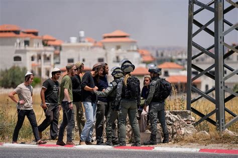 Israel beefs up troop presence in West Bank after Palestinian attack that killed 4 civilians